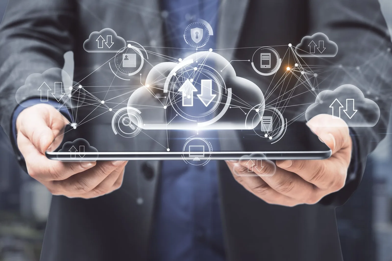 Business professional reviewing backup and disaster recovery data on a tablet