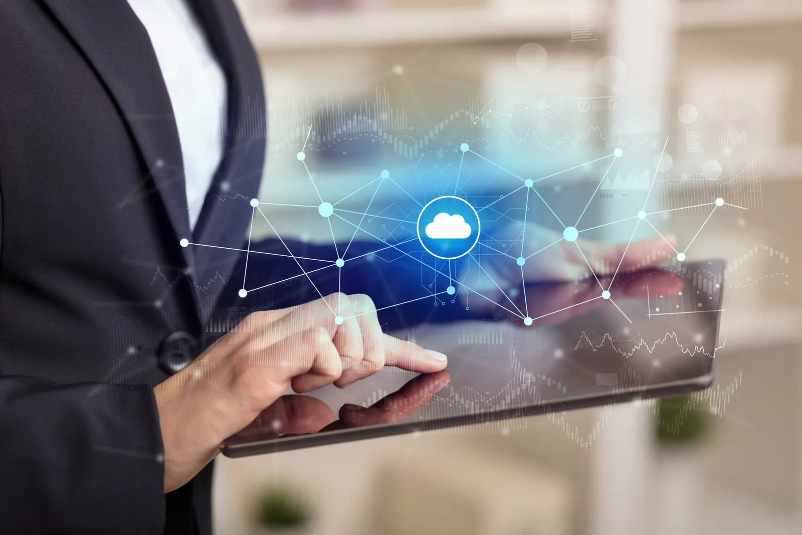 IT professional managing cloud services on a tablet