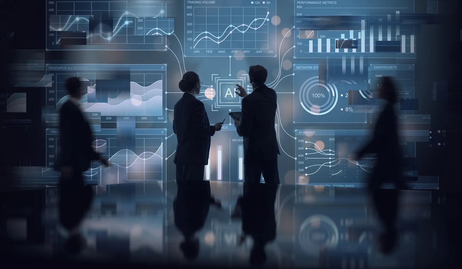 Business leaders reviewing IT performance dashboards while planning technology strategy